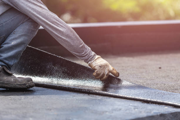 Professional Waterproofing technician working in Elwood, NY